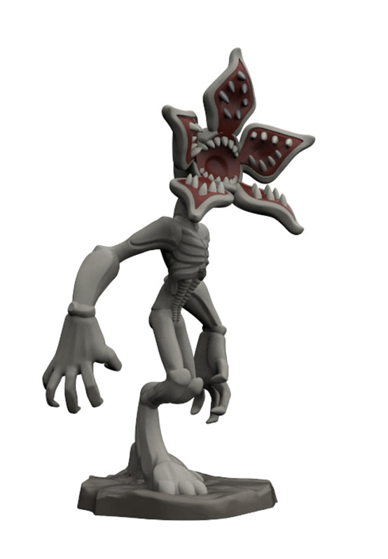 A 3D-rendered miniature figurine of a skeletal upside-down monster with a multi-armed head and sharp teeth, shown on a plain white background.