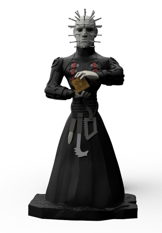 A black and gray horror character figurine with a pin-striped skull face, long dark dress, and small gold box in both hands, standing on a textured black base against a white background.