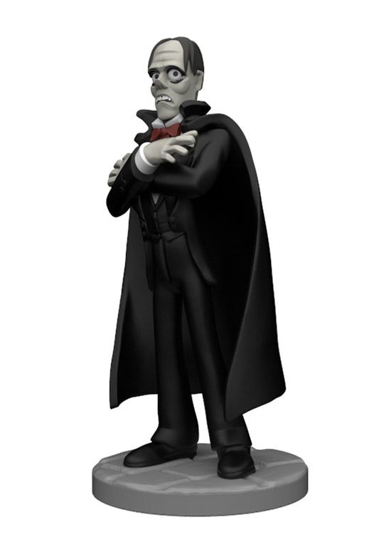 A collectible figurine of Dracula standing on a round gray base, shown against a plain white background.