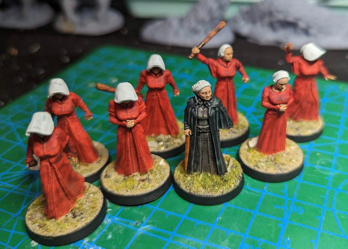 8 Maids of Vengeance, painted red with white bonnets on 25mm bases