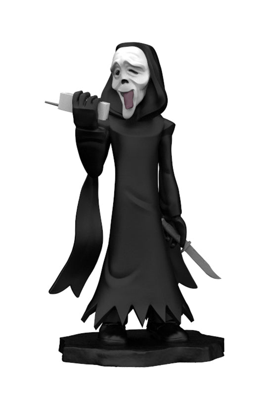 Caracter collectable miniature in black gown and white mask with tongue out